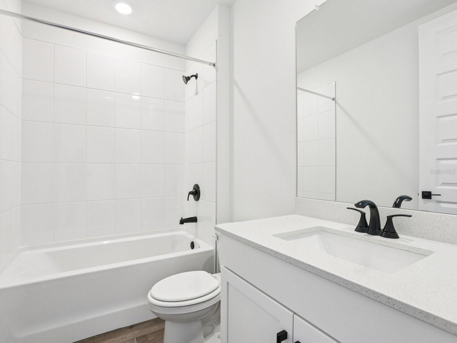 Interior photos are not of the actual home but are photos of the builder home with the same floorplan with similar interior finishes and features.