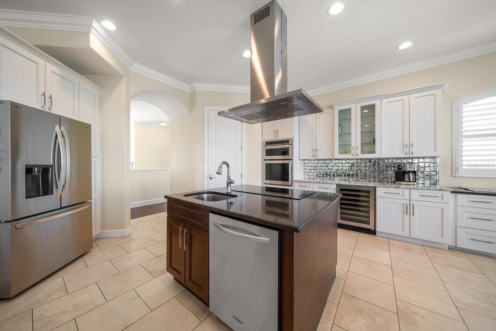 Meal prep is a breeze in a spacious and functional environment such as the one provided in this outstanding kitchen.