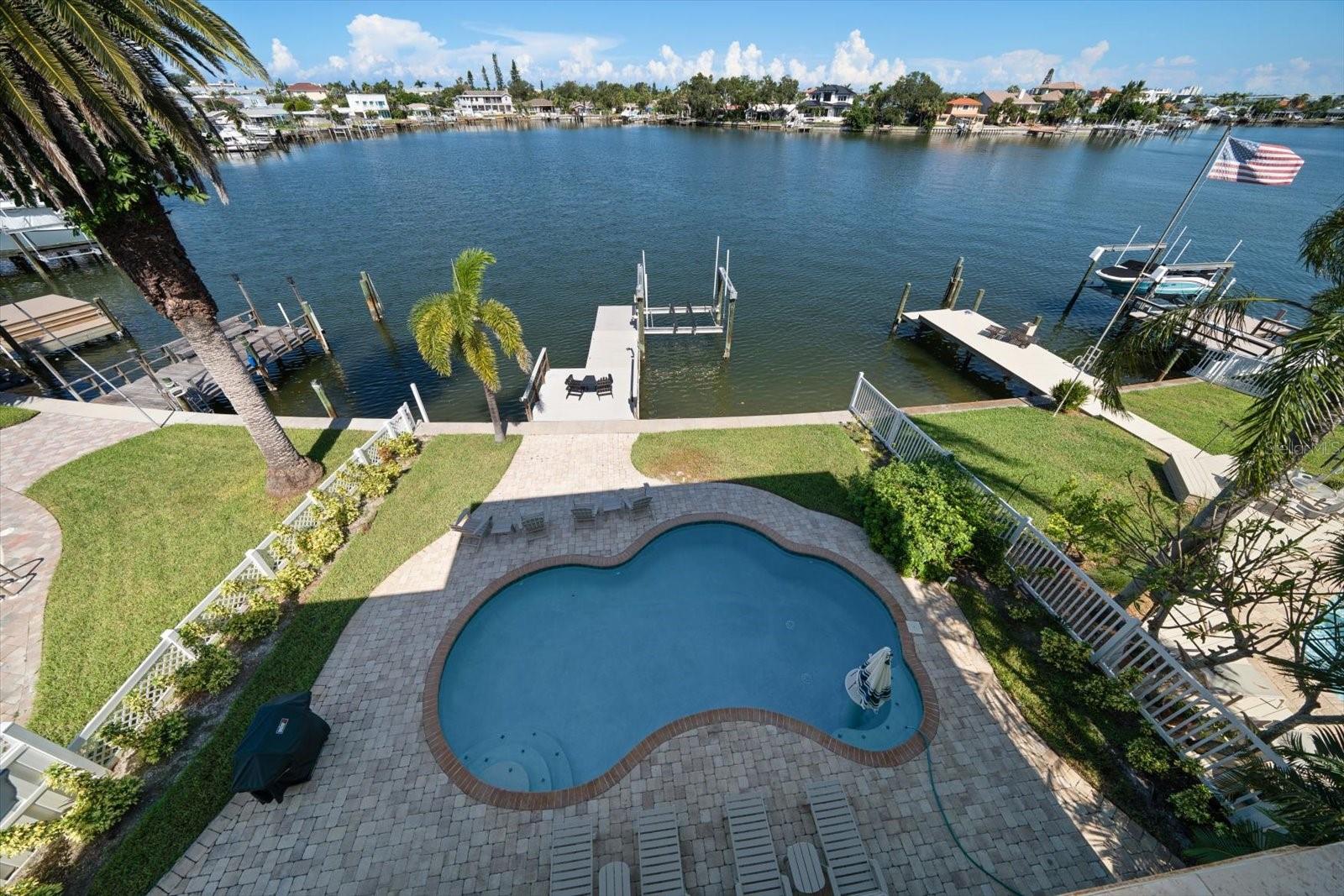 Find escape from the privacy of this magnificent waterfront residence, offering the perfect blend of indoor & outdoor living.