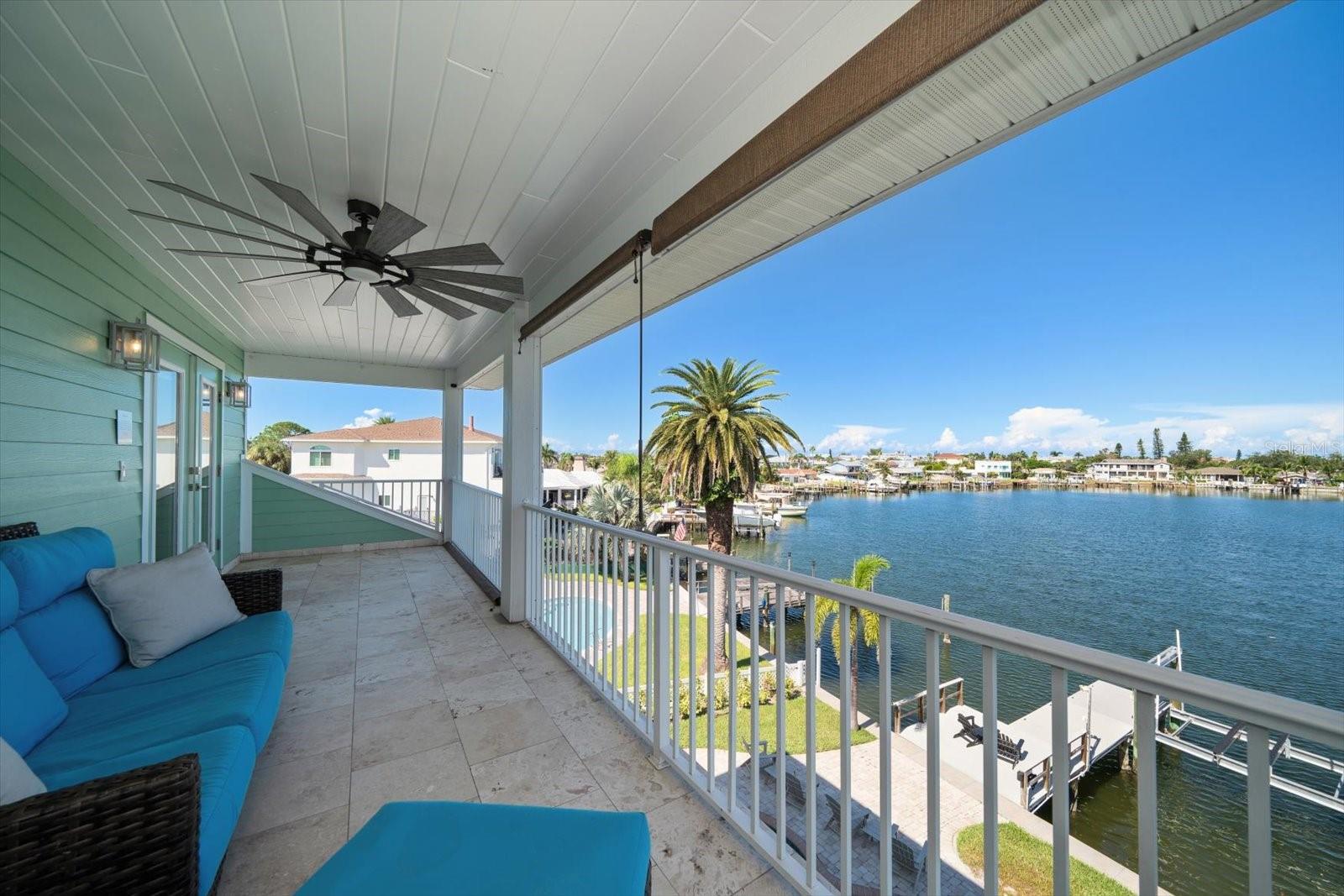 Private balcony accessed from the primary suite offering sensational views of the water.