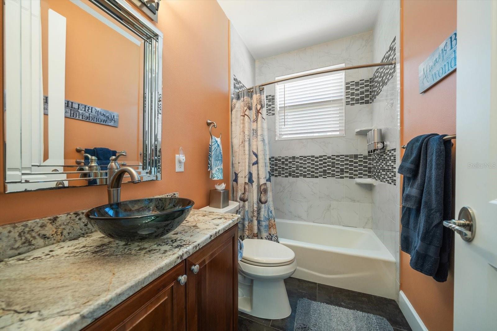 Guest bathroom on main living level.