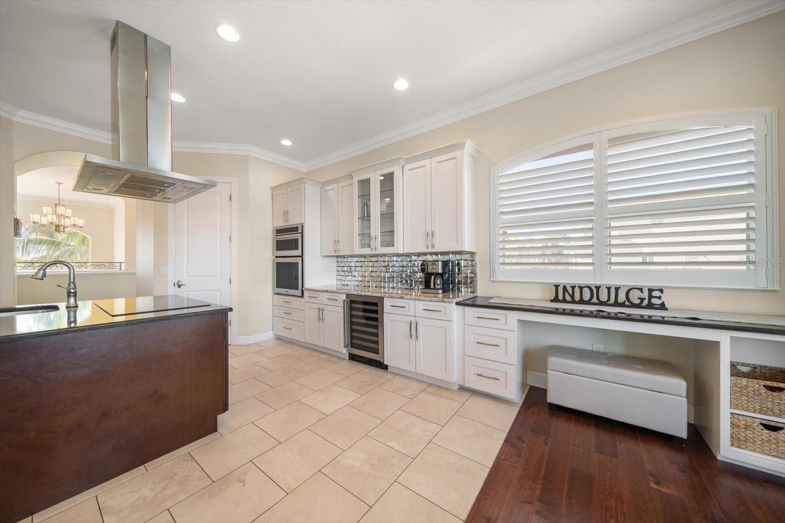 Perimeter space in kitchen area is extensive and appreciated