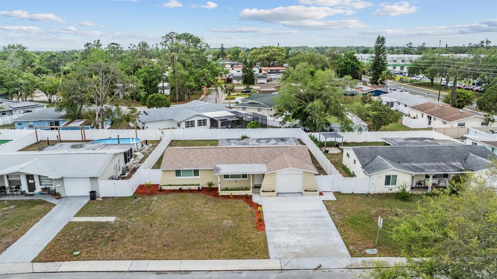 Fenced back yard - extended driveway