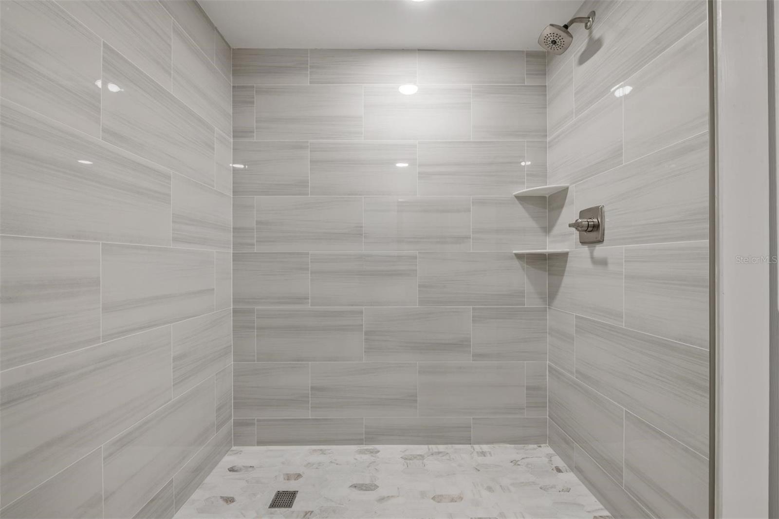 Large luxurious shower in 2nd bathroom.