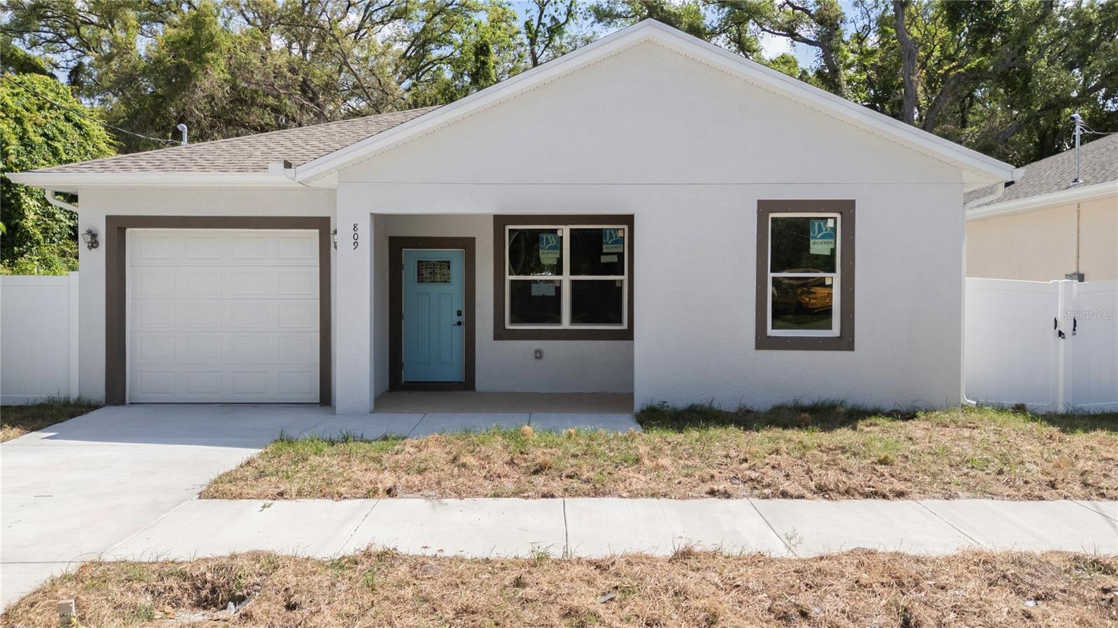 Feel safe and secure in this new community home close to shopping, dining, and the VA hospital.Brand new construction built to the very latest Florida Building Code standards.