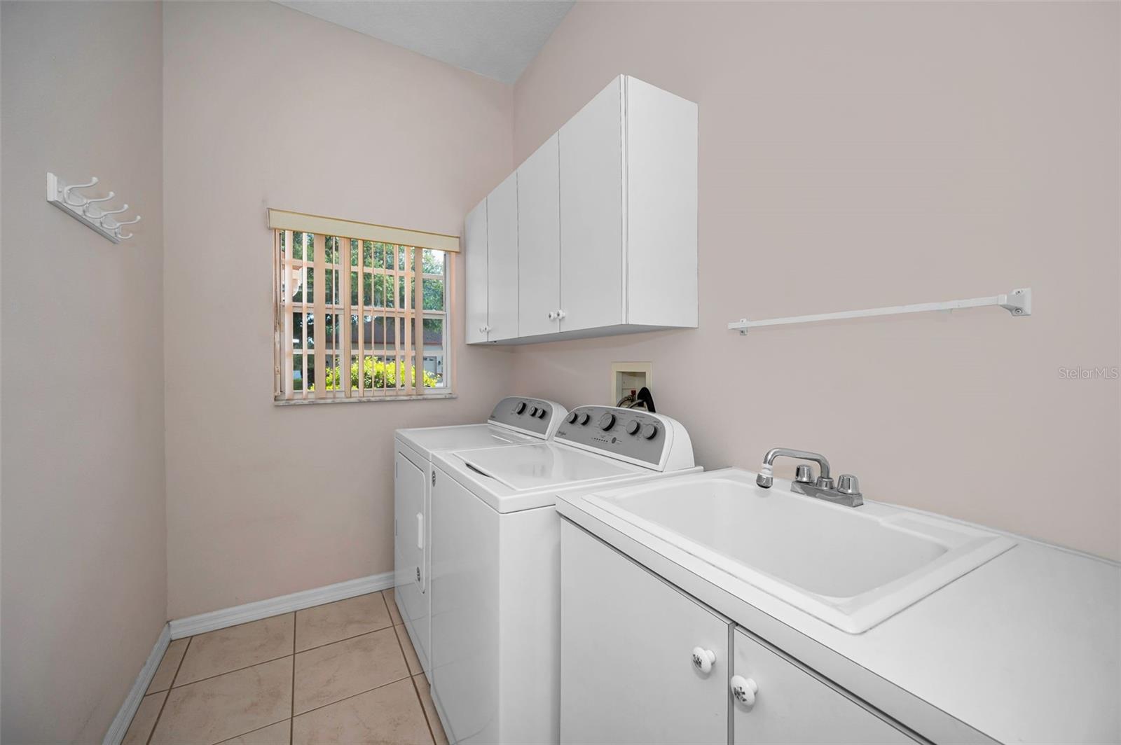 Laundry Room off of kitchen near garage
