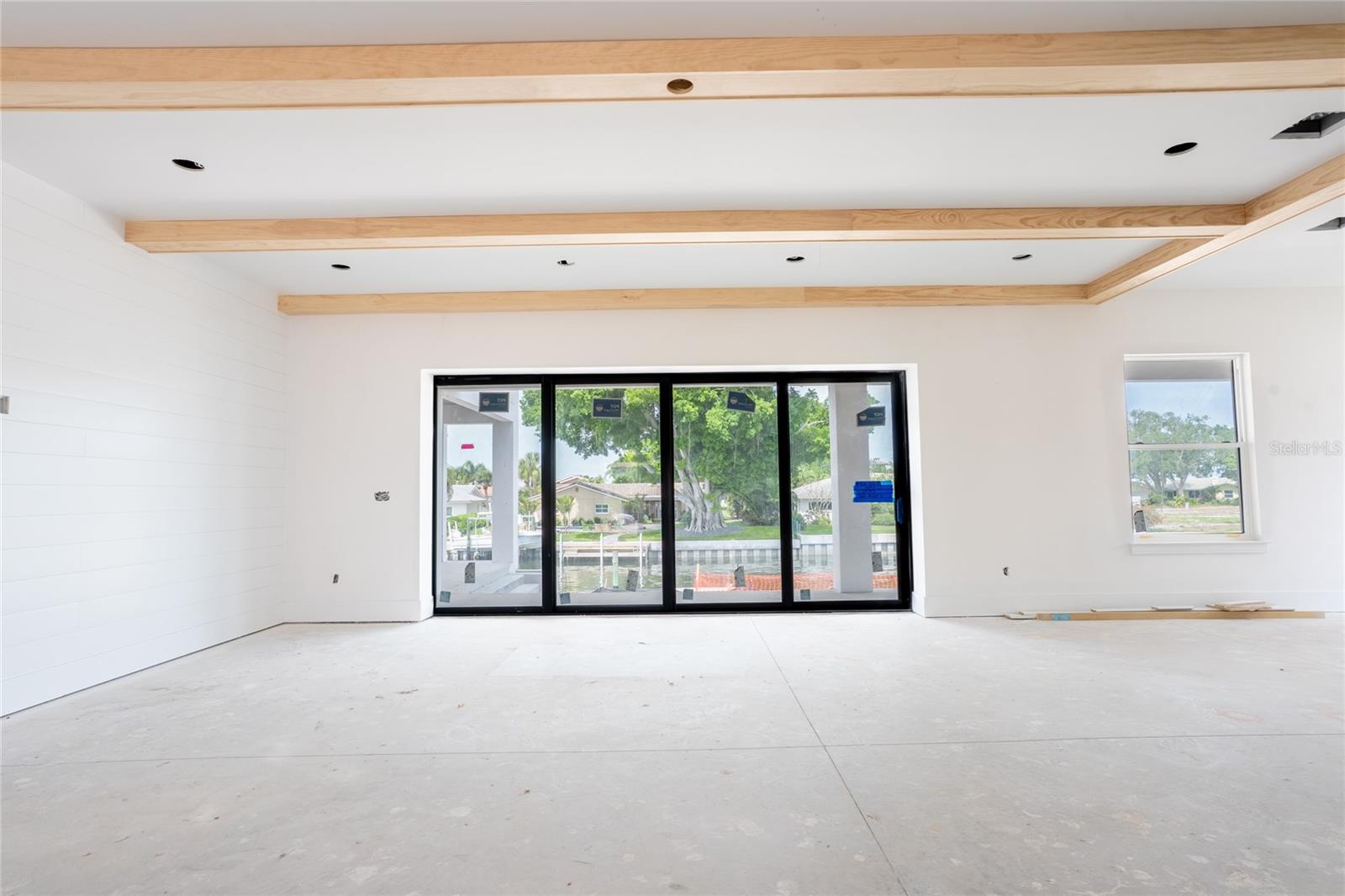 Living room with access to the outside patio/pool