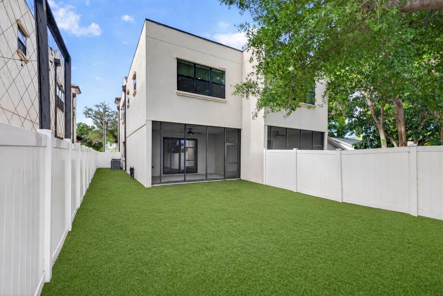 Photo AI-generated to show potential of future turf in the backyard.