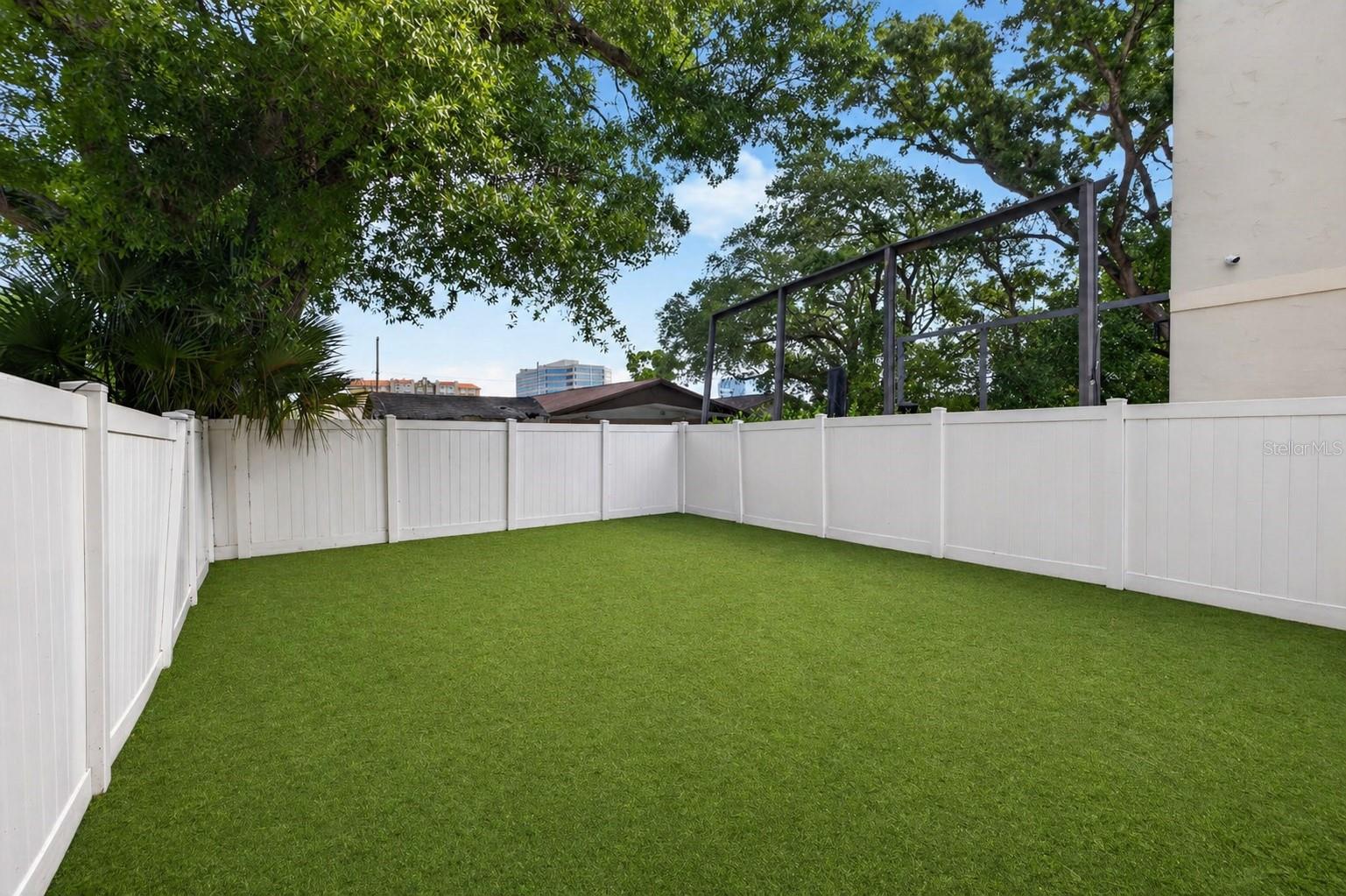 Photo AI-generated to show potential of future turf in the backyard.