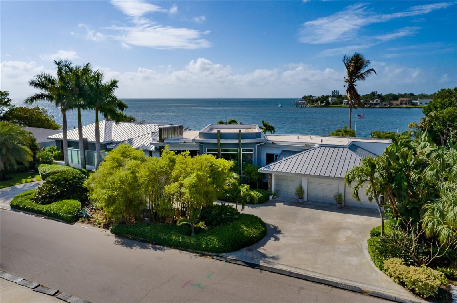 Metal Roof, Hurricane rated, tinted windows, whole house generator....see list of features for more!