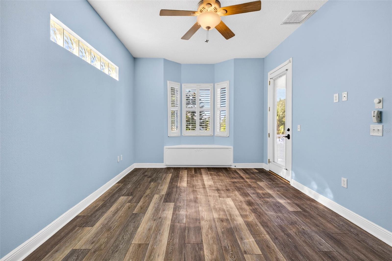 PRimary bedroom facing porch walkout