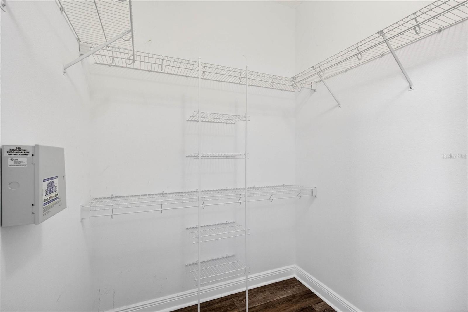 Primary bedroom viewed from primary bathroom