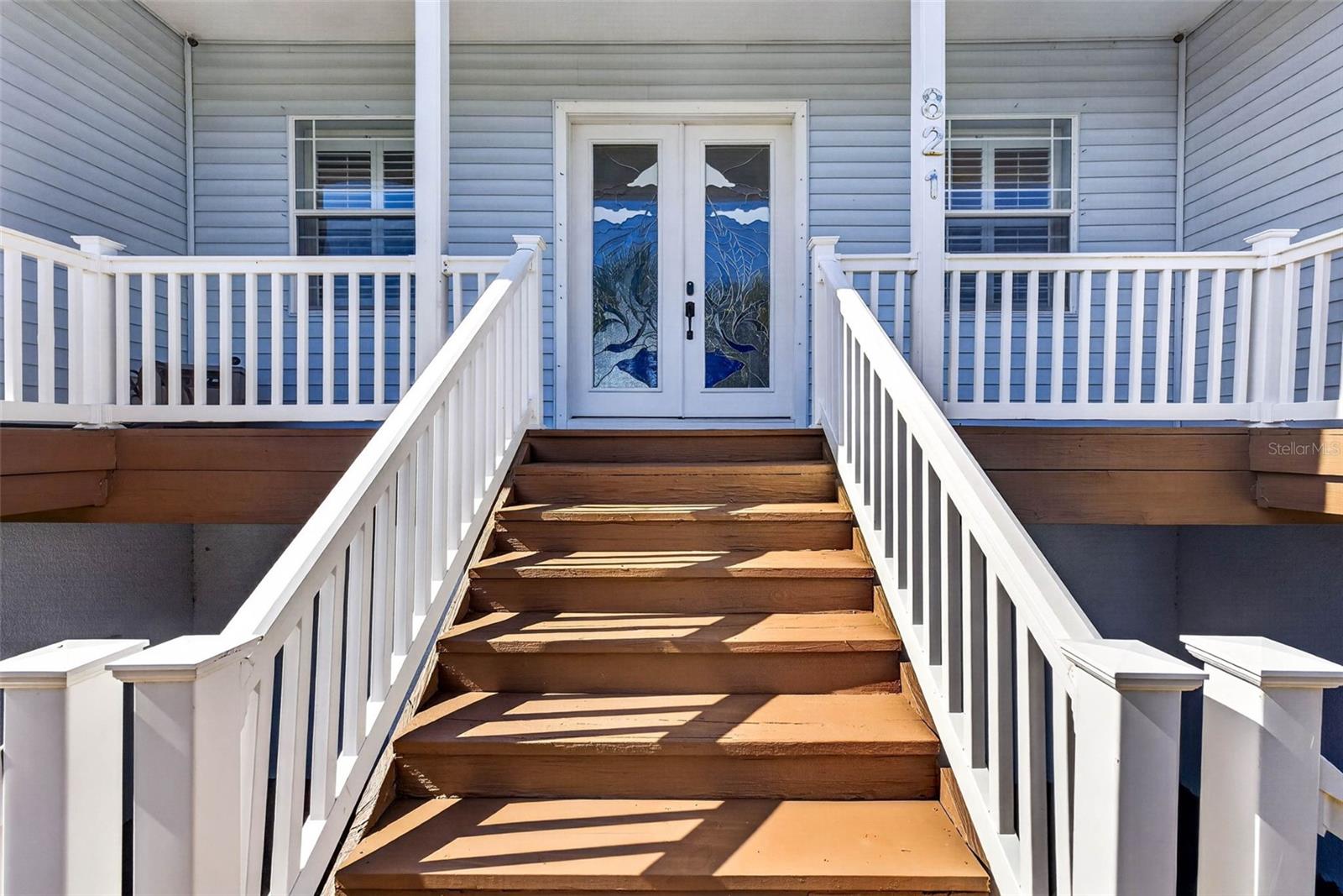 Front porch thats wraps around the house to the back porch.