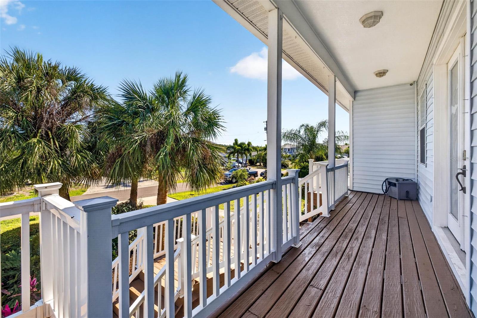 Living room from front of house looking out towards the rear porch and water