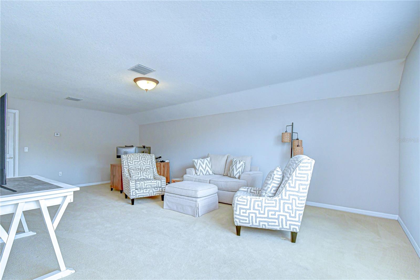 Flexible space for media or recreation.