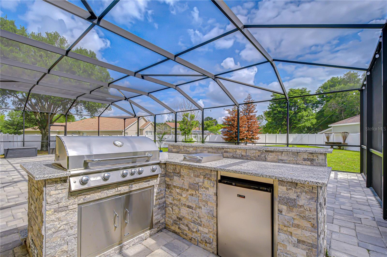 Fully equipped with grill, burner, and refrigerator.