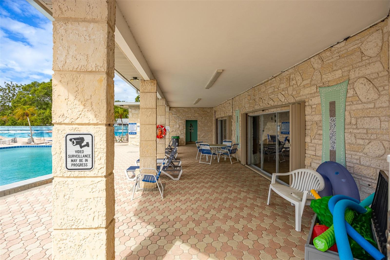 Shaded Sitting Area By Pool