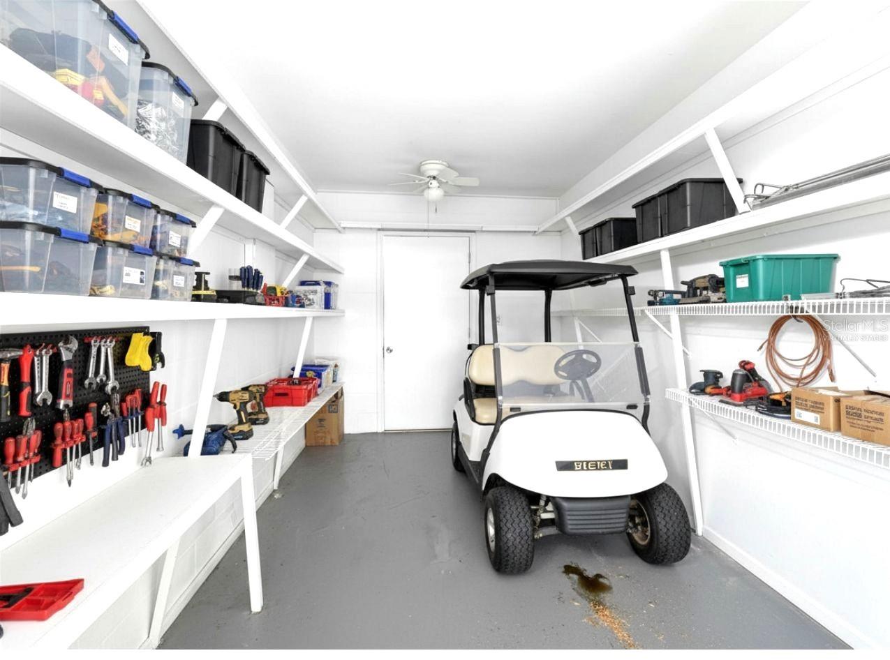 This photo is virtually staged. There is no golf cart