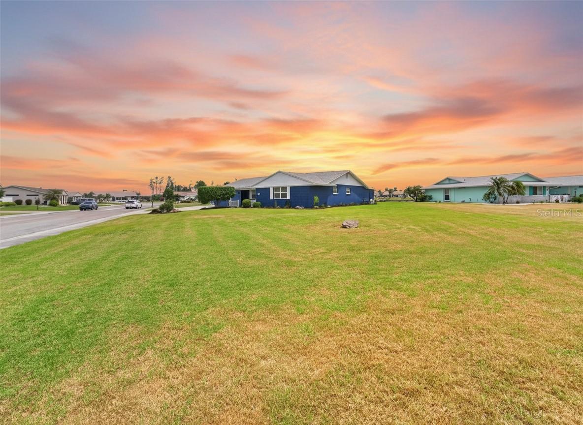 Huge corner lot. 30 of an acre, overlooking Middle Lake. There's not another lot like this one in all of Sun City Center.