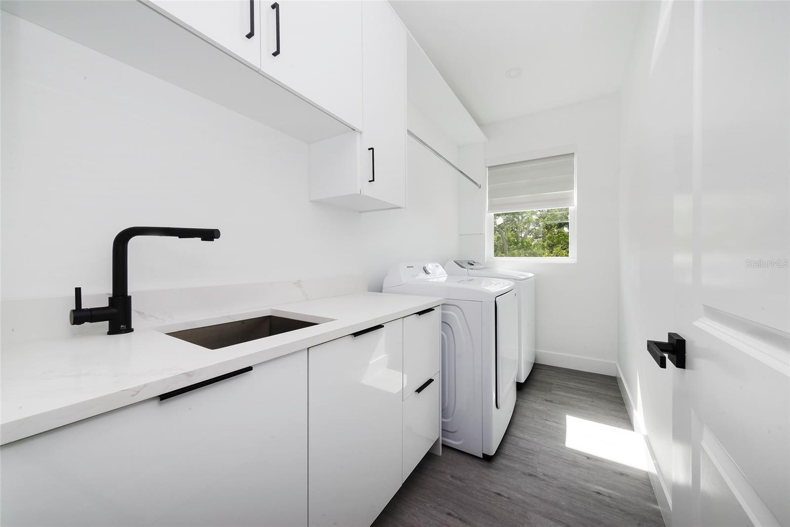 Laundry Room with Sink and Cabinets on 2nd Floor