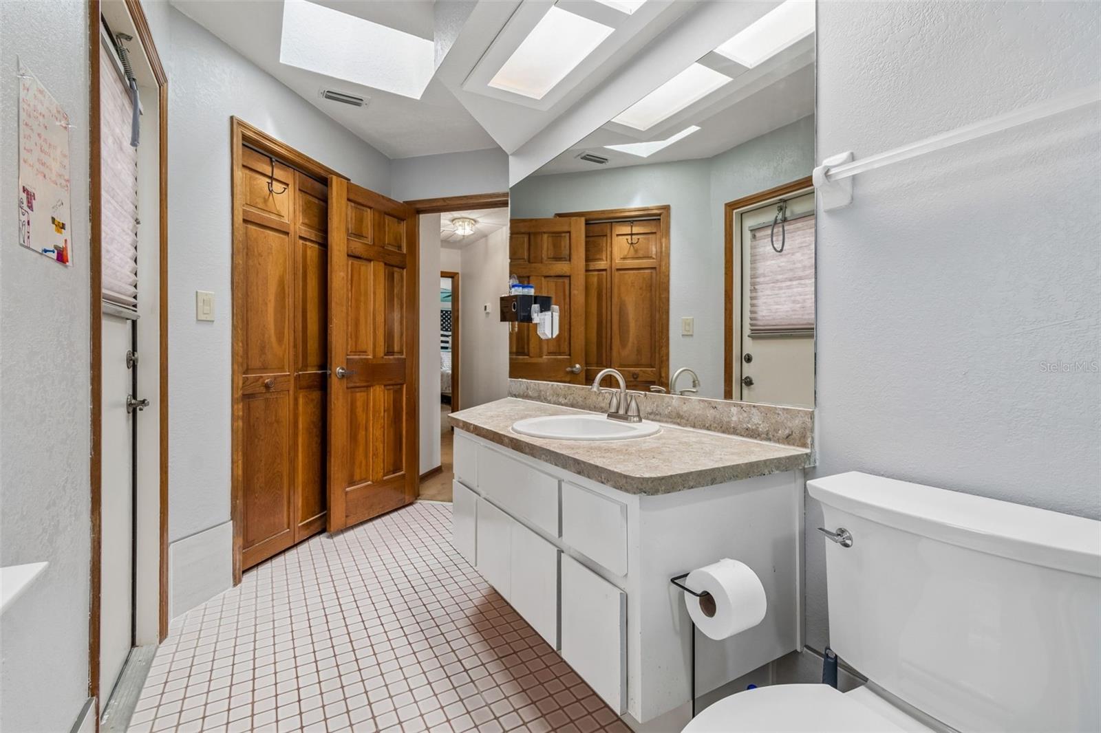 Second bath - pool access - linen closet