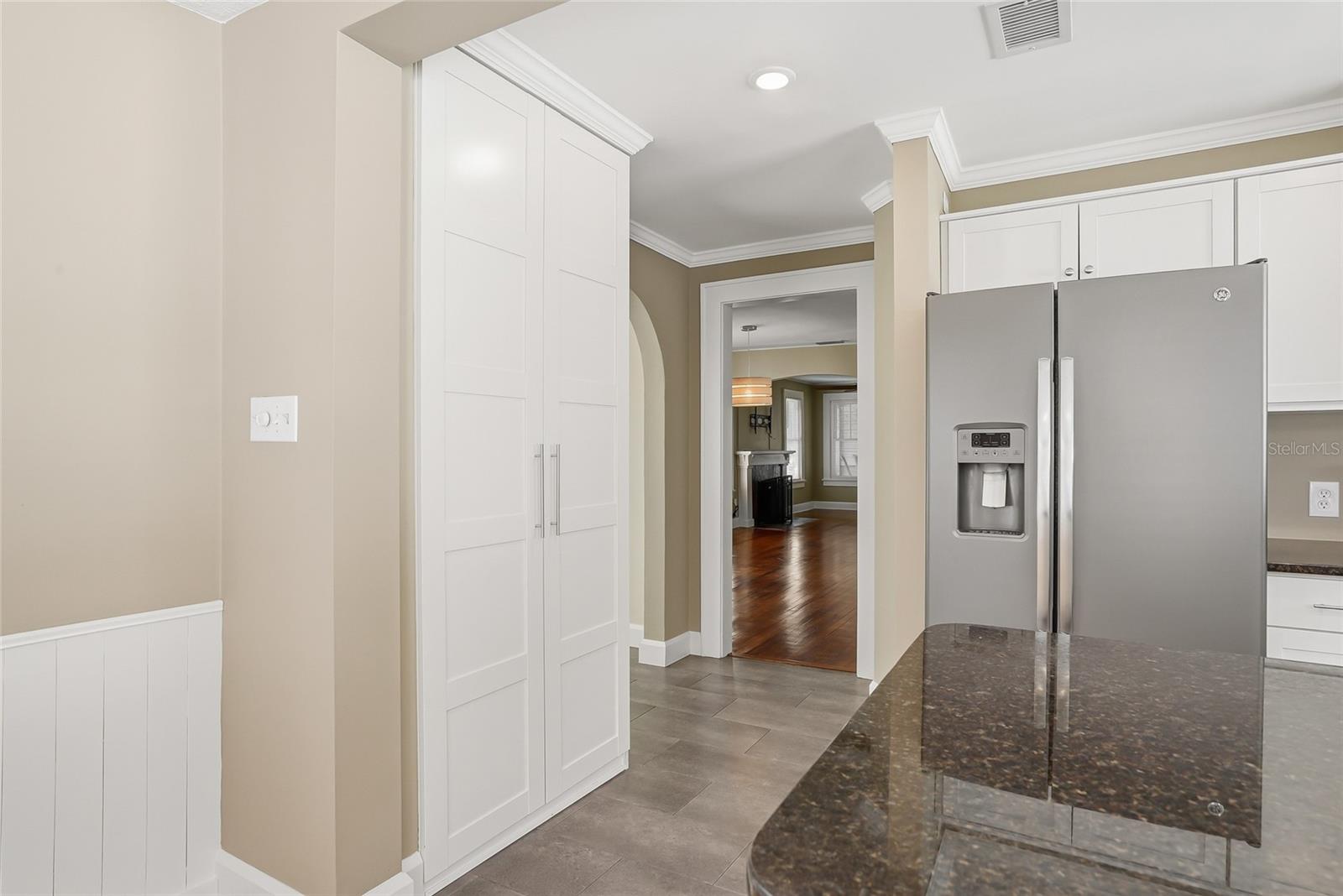 Large pantry closet to tuck away all of your cooking gadgets.