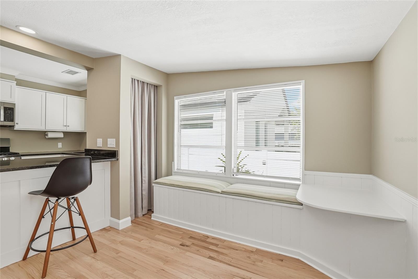 Filled with natural light and complete with charming window bench seating.