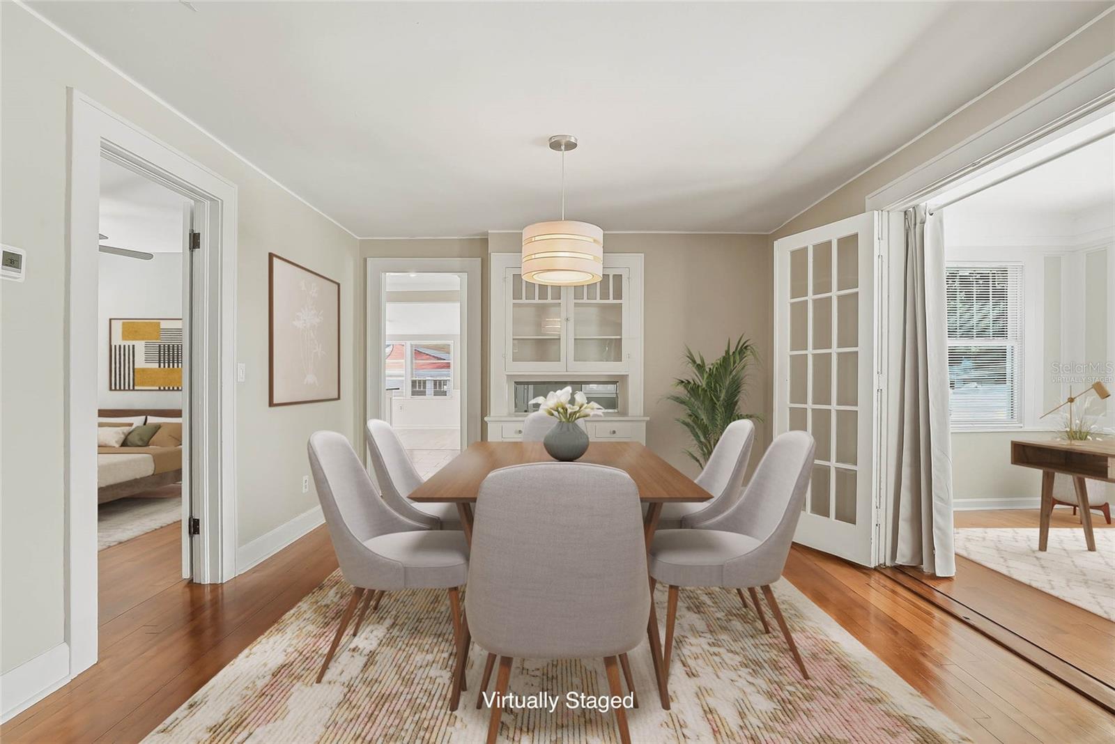 Virtually staged. Dining room.