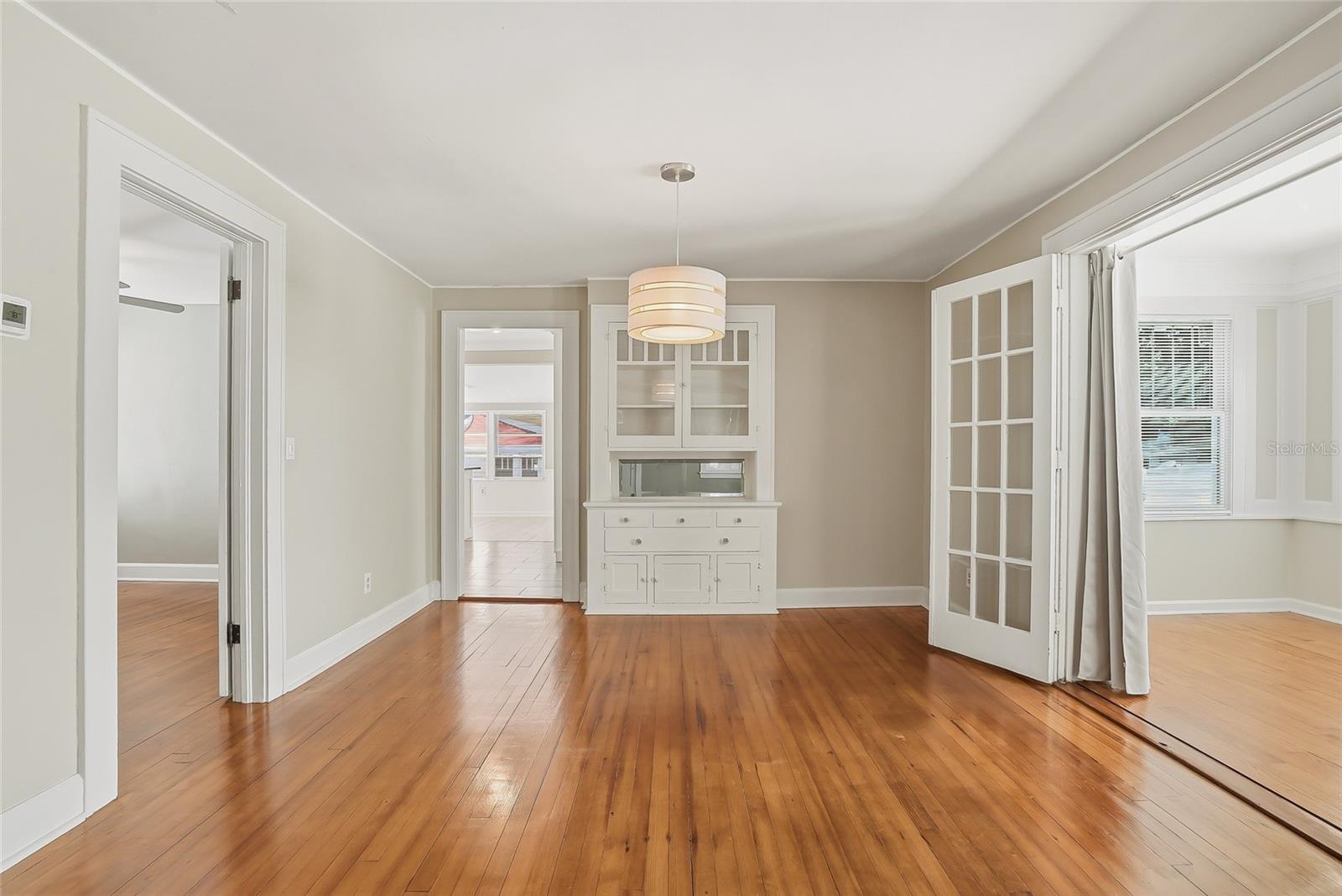 The dining room is complete with classic built-ins ready to showcase treasured pieces and personal collections.
