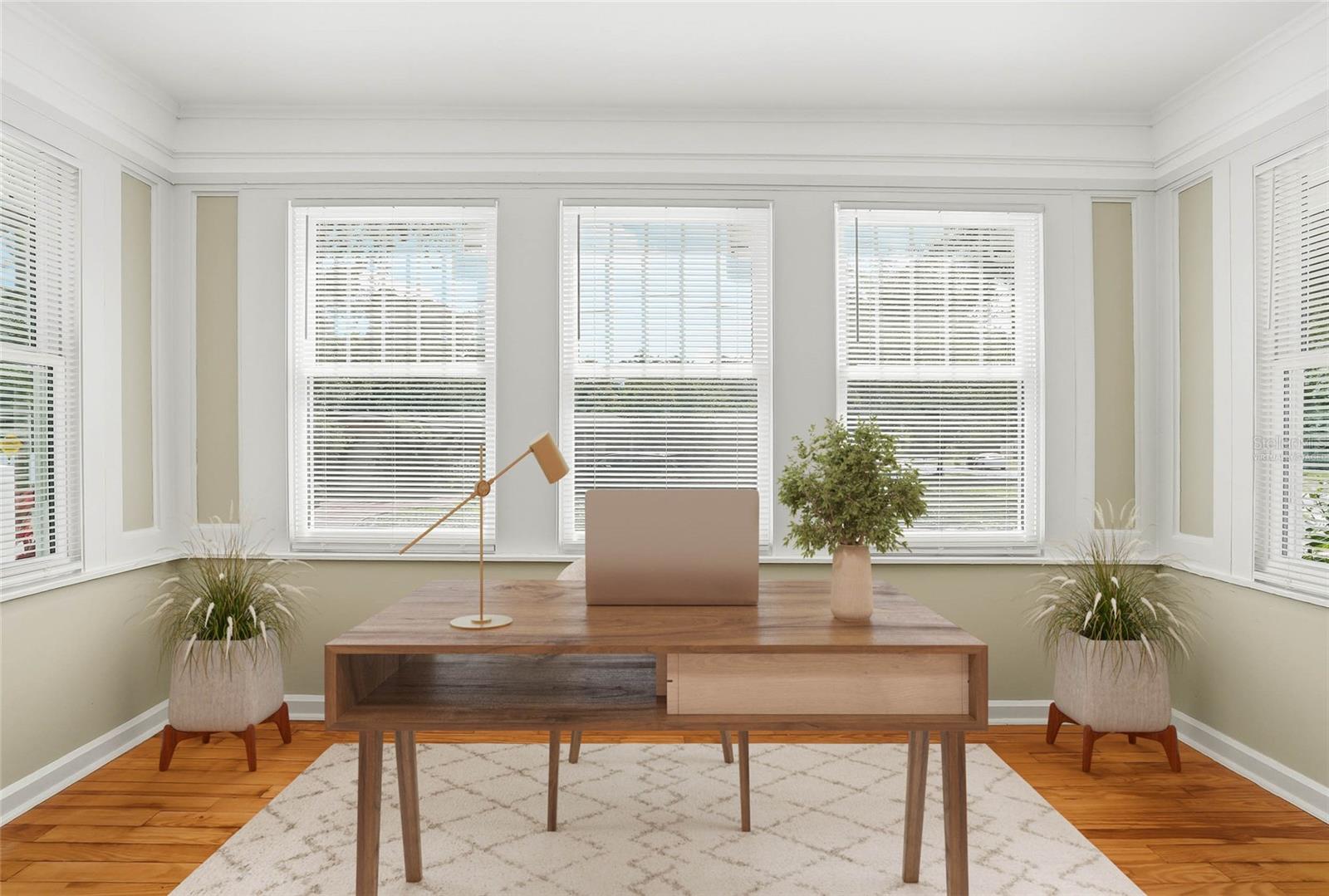 Virtually staged sunroom.
