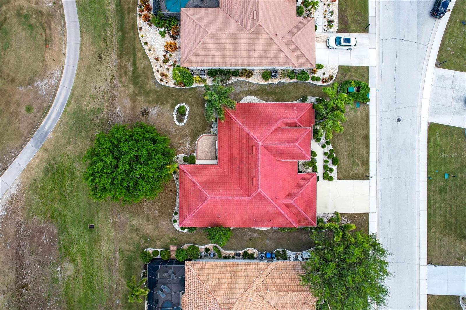 Aerial view of home and large shade tree