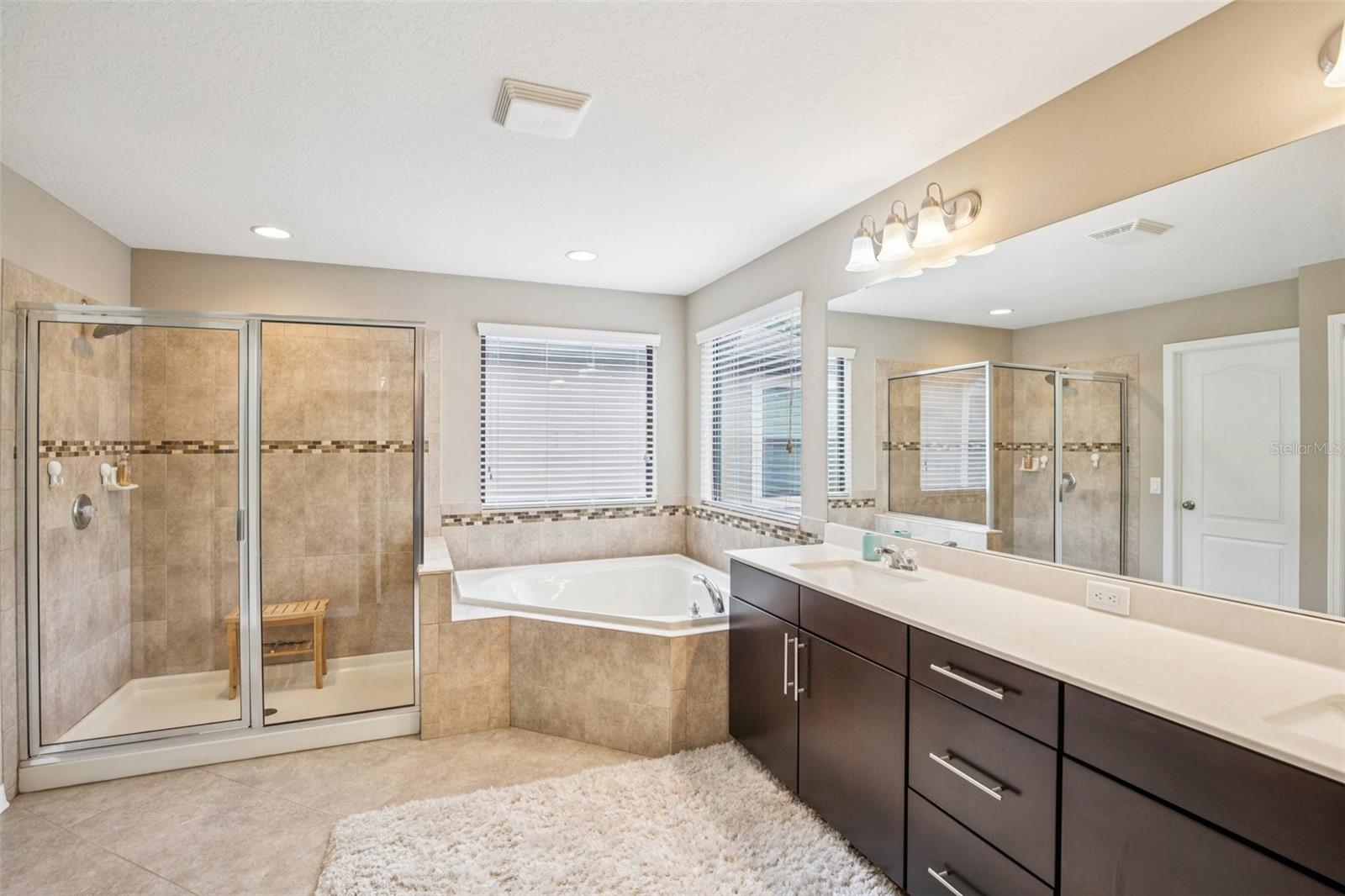 PRIMARY BATHROOM HAS GARDEN TUB AND WALK-IN SHOWER FOR ALL THE LUXURIES!