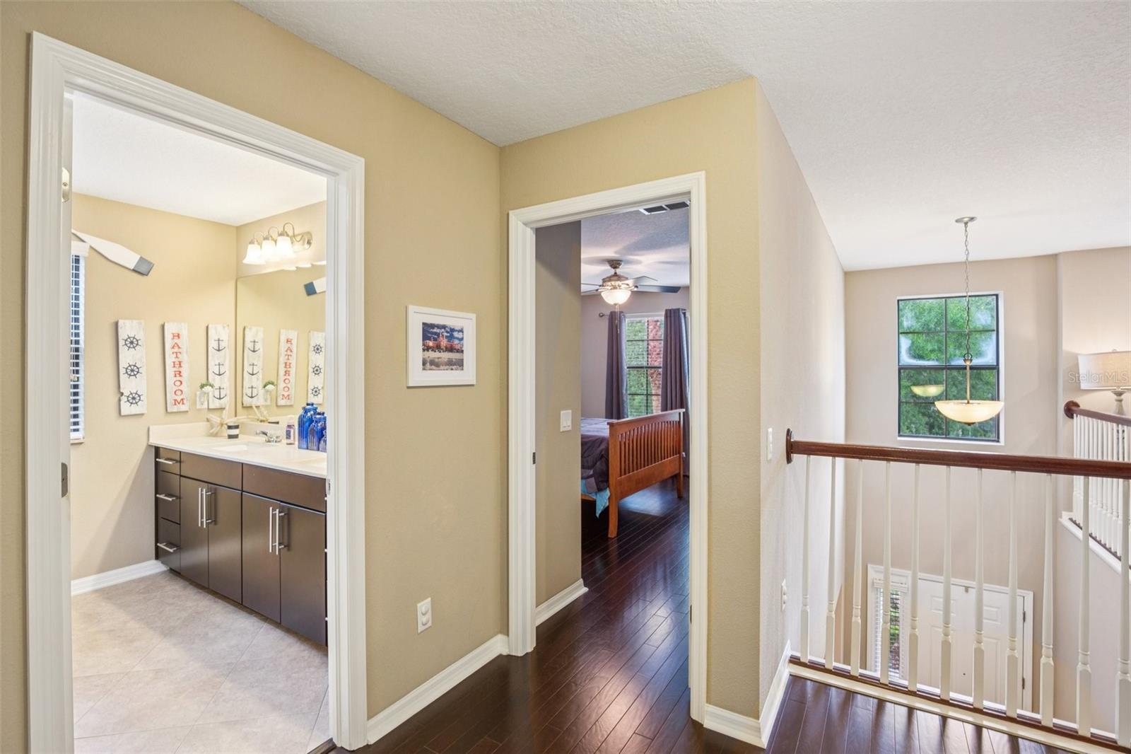 HALL VIEW TO BEDROOM AND BVATHROOM UPSTAIRS