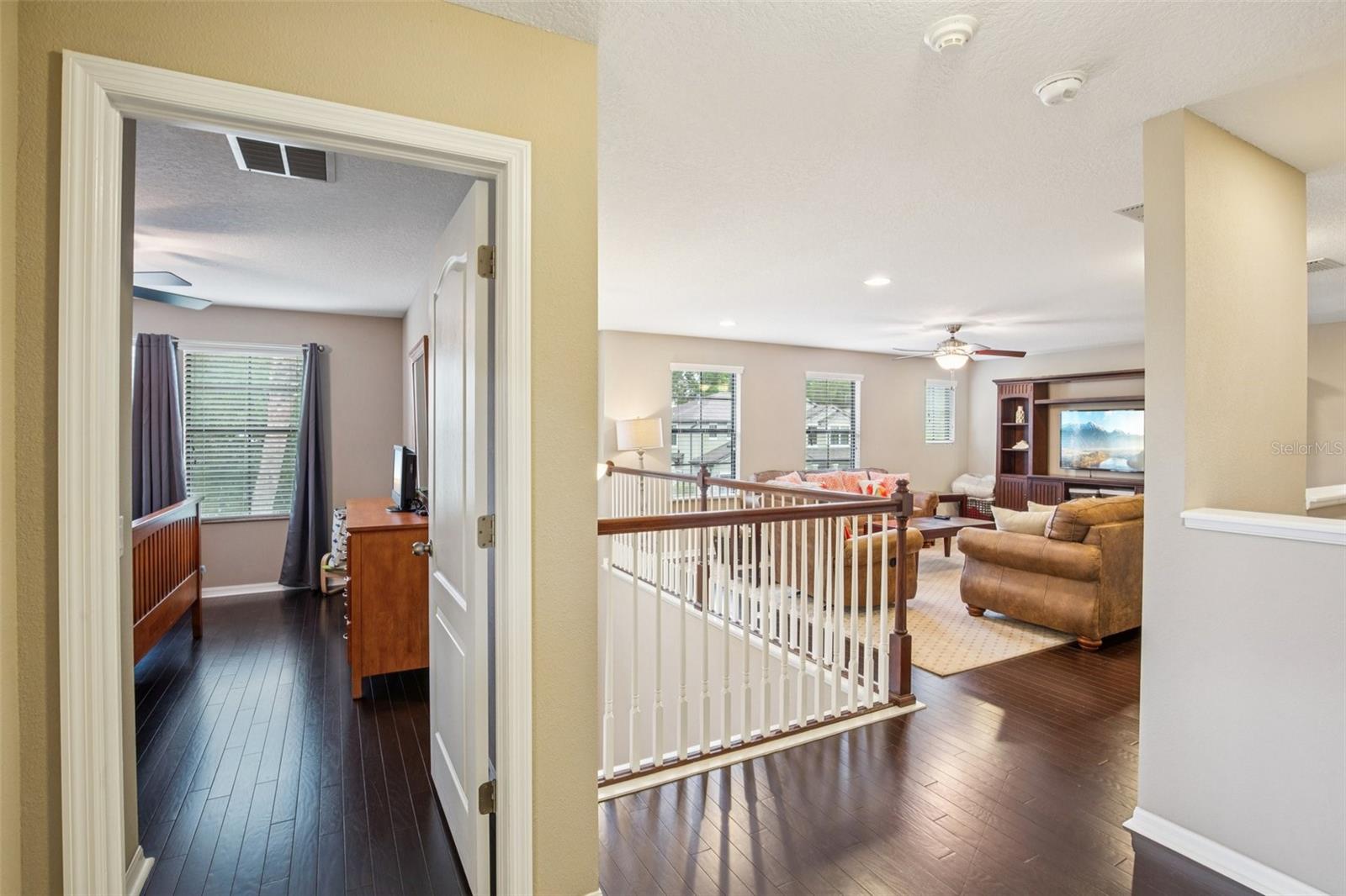 HALL VIEW TO BEDROOM AND BONUS ROOM