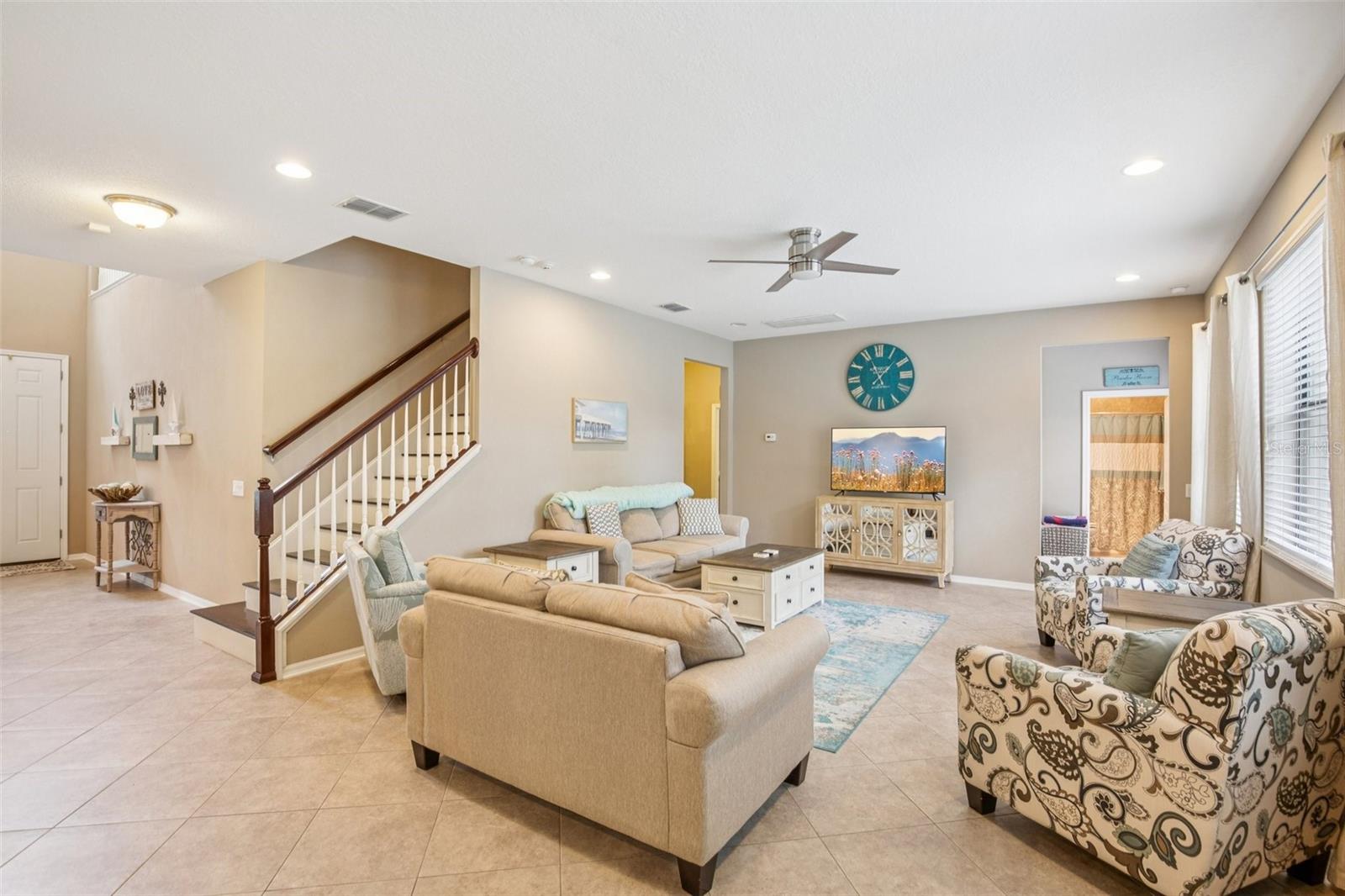 LIVING ROOM HAS TONS OF NATURAL LIGHTING!