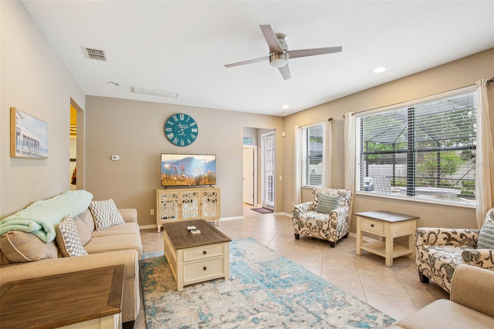 LIVING ROOM HAS TONS OF NATURAL LIGHTING!