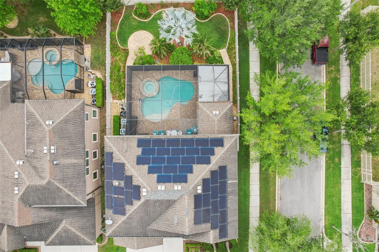 AERIAL VIEW OF BEAUTIFULLY MAINTAINED CORNER LOT!