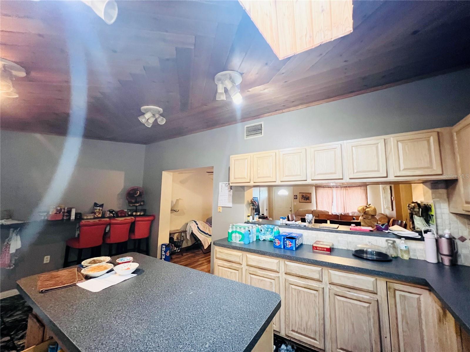 KITCHEN LOOKING OUT OVER ISLAND