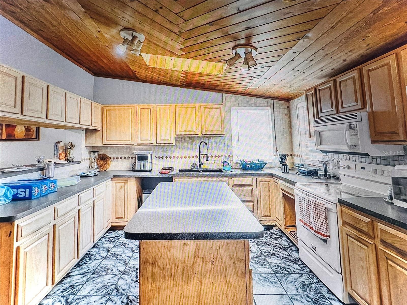 KITCHEN VIEW FROM BREAKFAST AREA