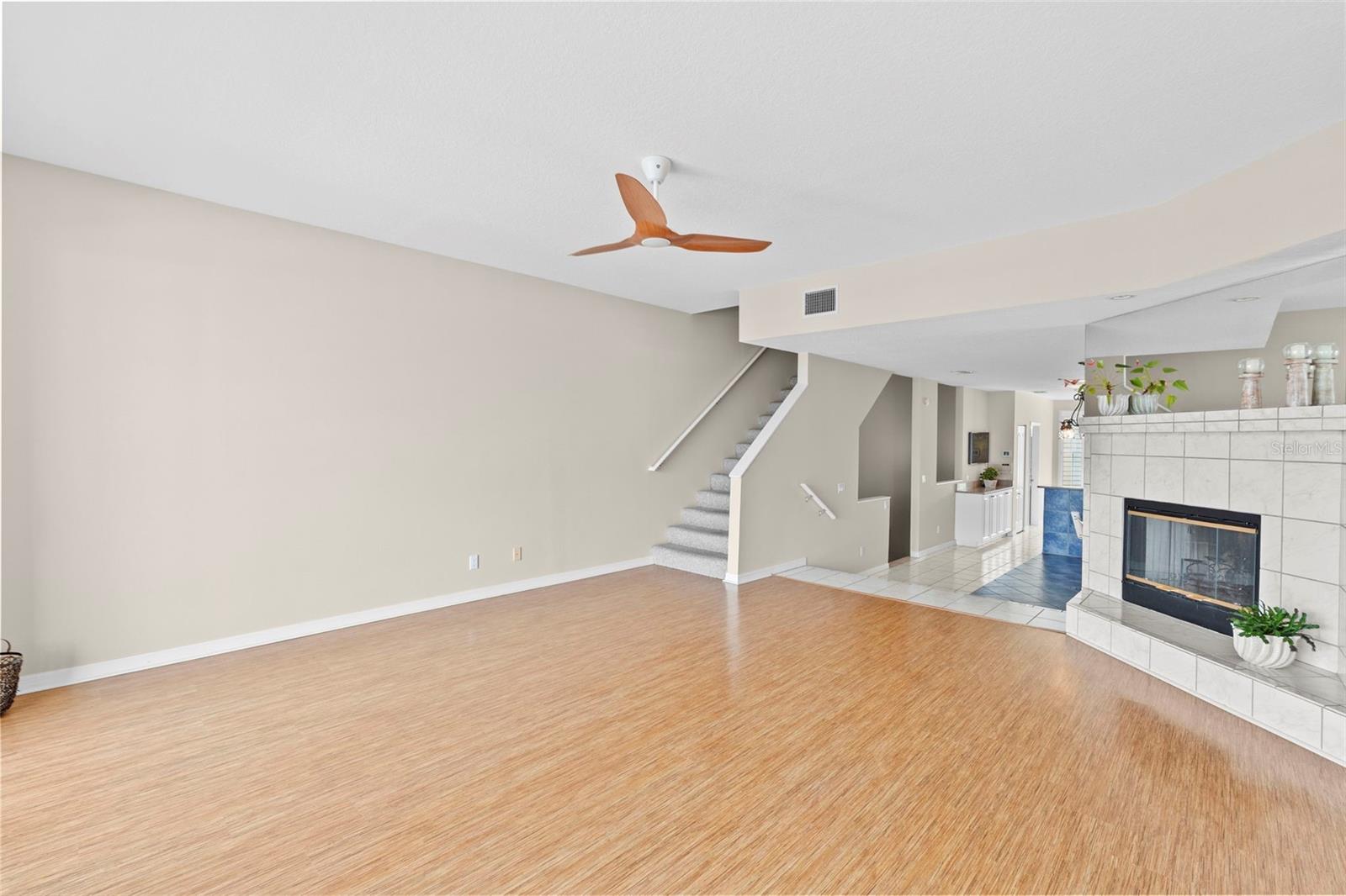 Living Room toward the Dining Room and Upper Level
