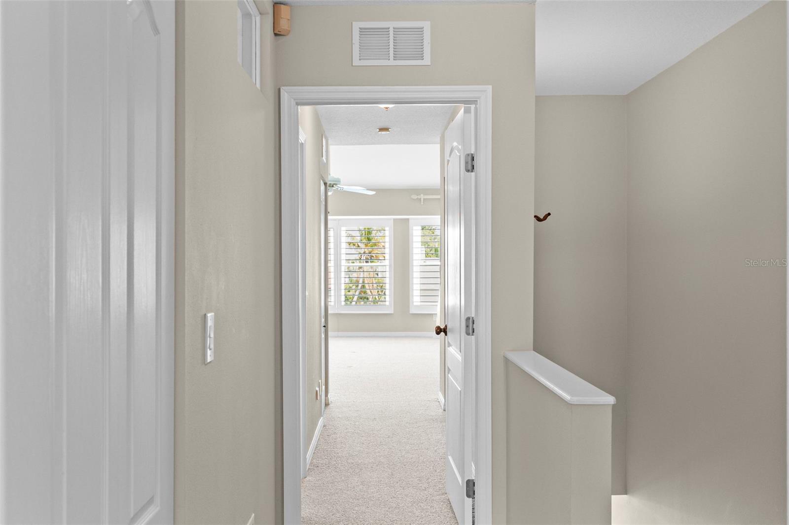 Upper Level Landing to Primary Suite