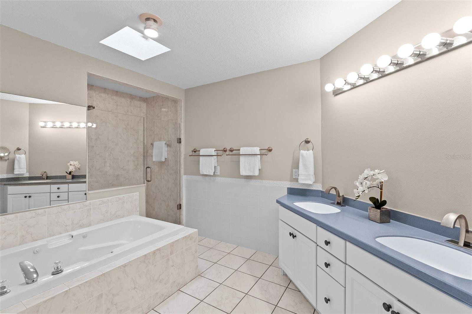 Primary Bath has a Double Vanity, Jetted Tub and Separate Shower