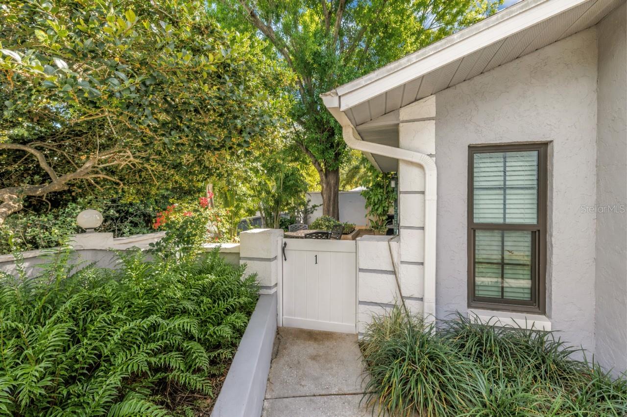Private courtyard entry to unit #1