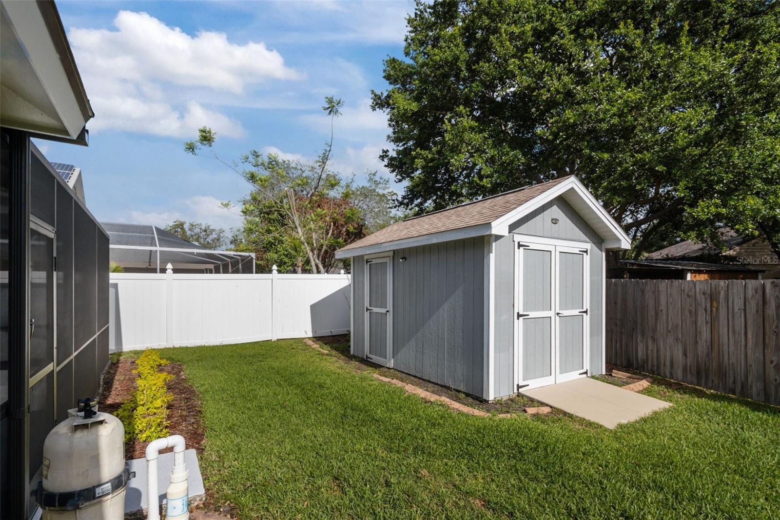 Custom built shed with built in storage and 2 doors.