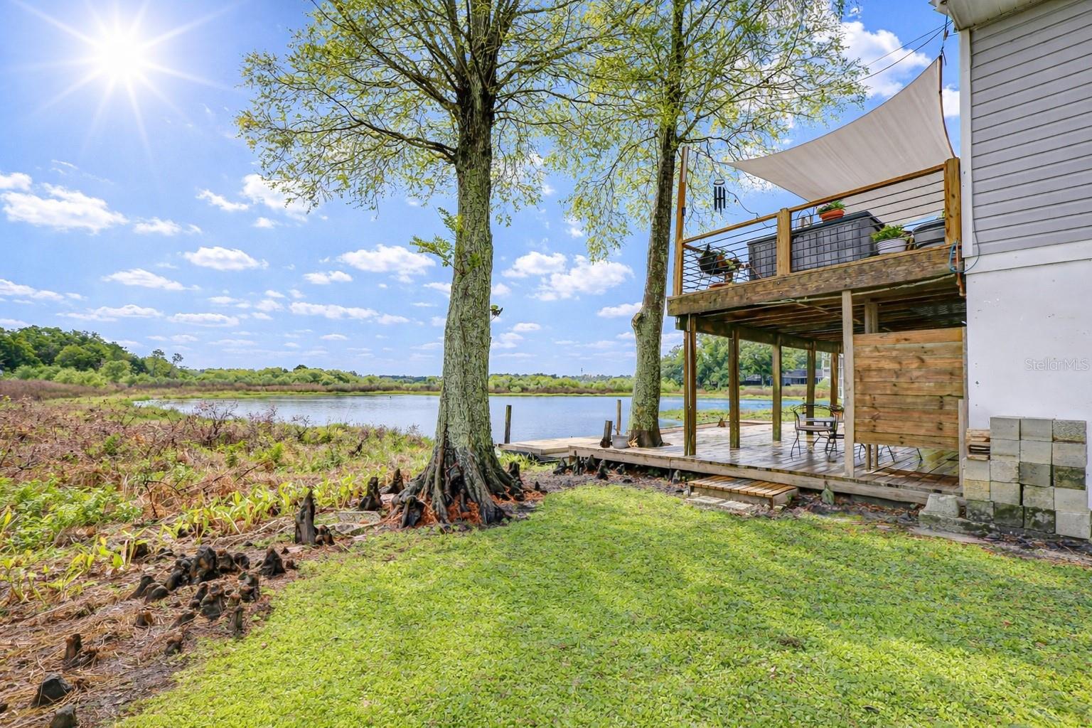 Rear Exterior with Lake Views
