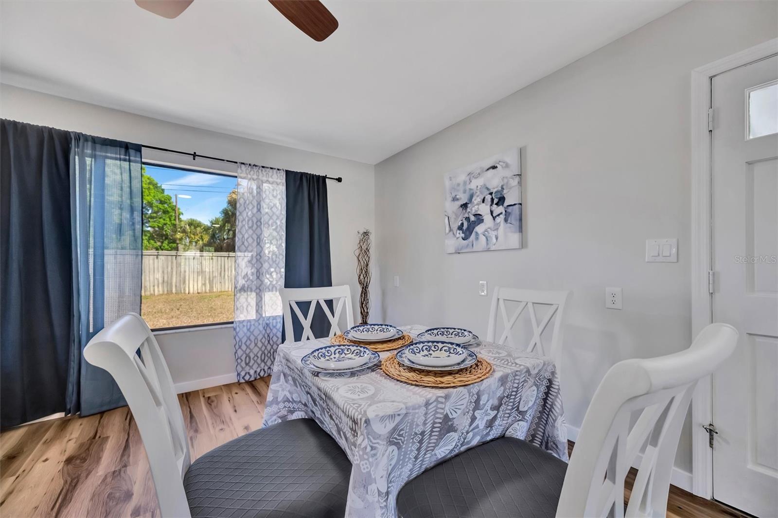 The Dining area and the door leading to the back yard
