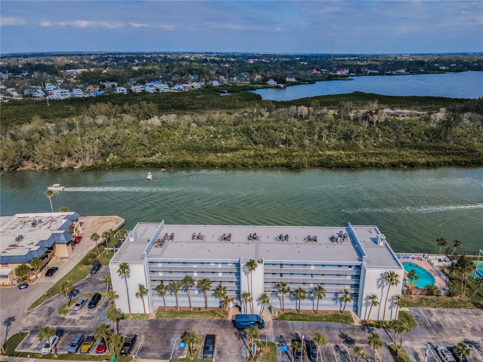 Let the soothing water views from your balcony set the tone for effortless coastal living