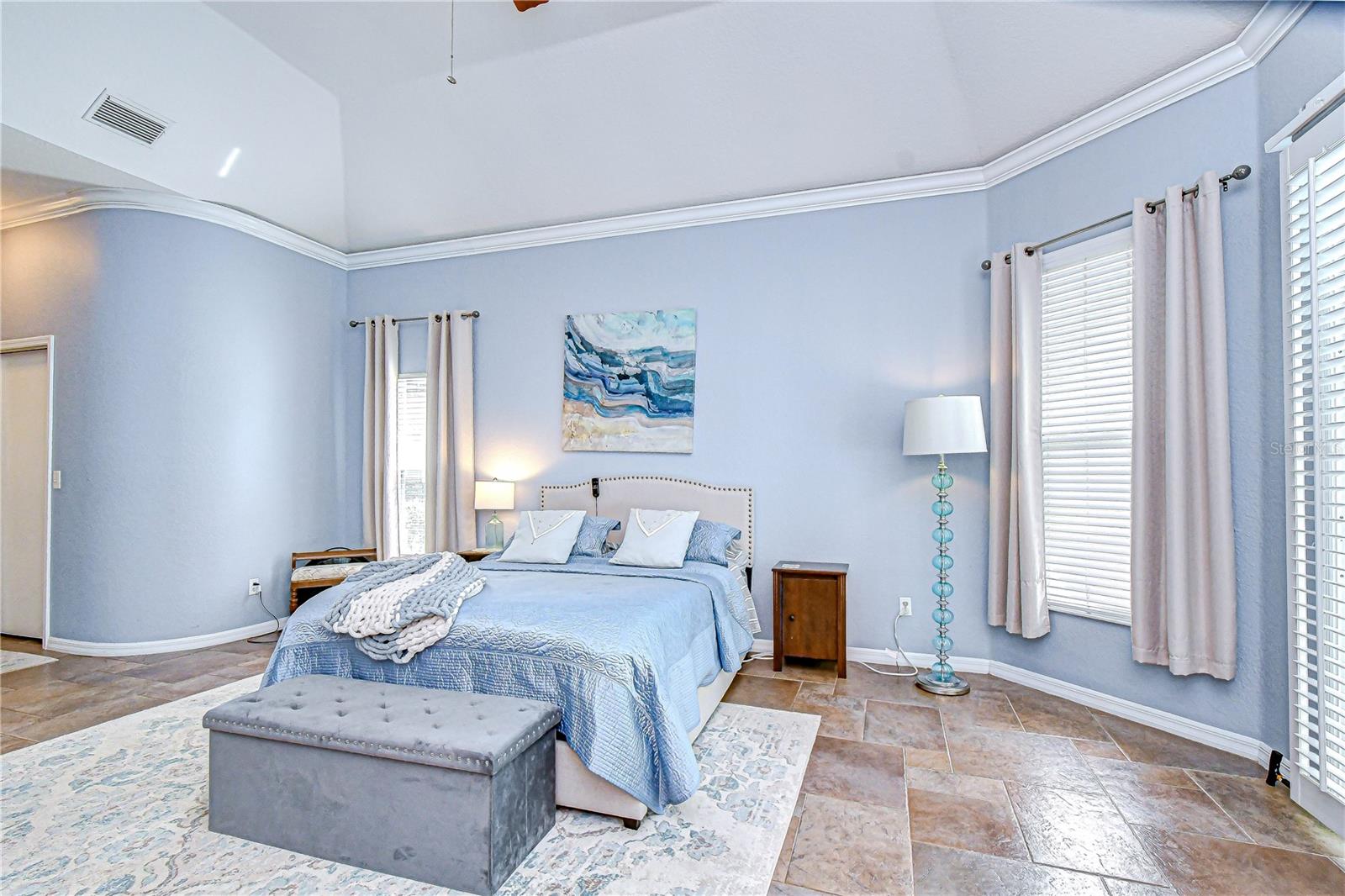 Light-filled bedroom with peaceful views