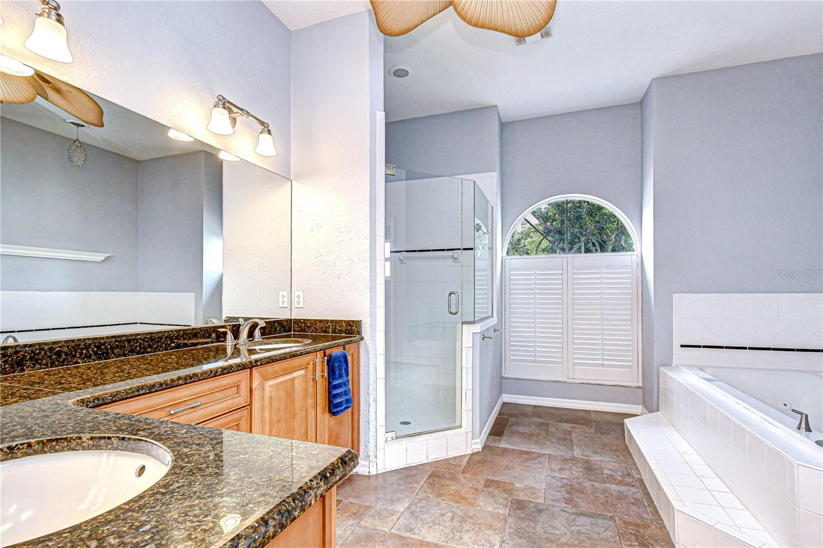 Spa-like primary bath with dual vanities