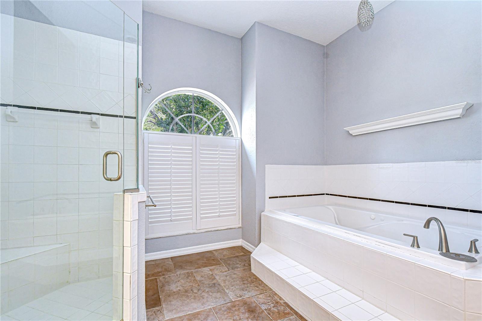 Relaxing soaking tub and separate walk-in shower